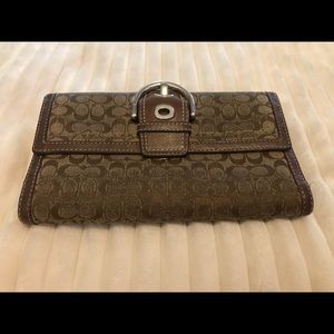Used wallet and checkbook holder Coach signature